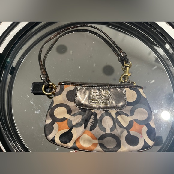 Coach Handbags - Used Coach Signature C Monogram Multicolor Wristlet Zip Top